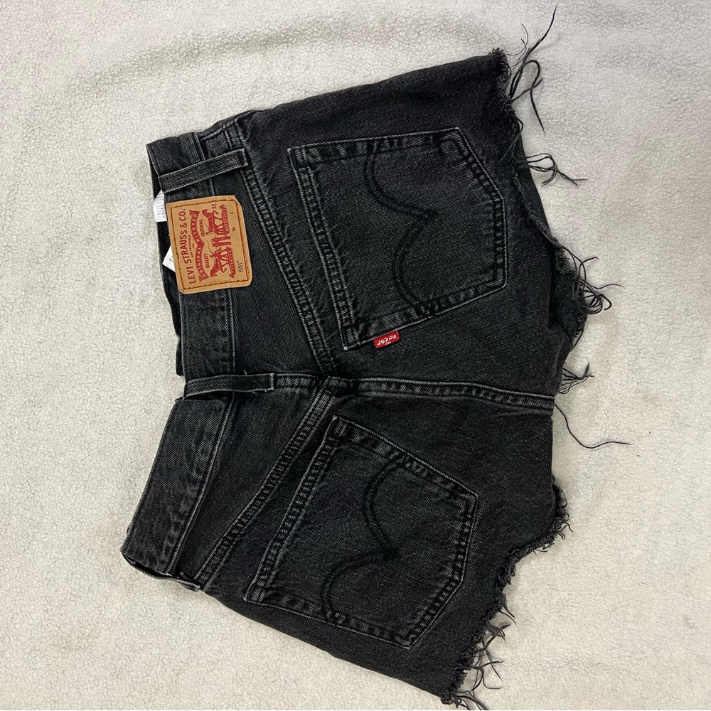 Black Levi’s jean shorts (size 24)